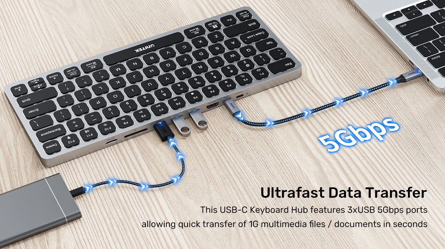 UNITEK Keyboard with 9-in-1 USB-C Hub, 3x USB 3.0, 4K HDMI, SD Card, AUX, 100W PD Charging UNITEK Keyboard with 9-in-1 USB-C Hub, 3x USB 3.0, 4K HDMI, SD Card, AUX, 100W PD Charging