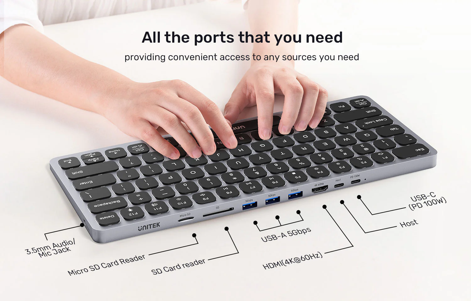 UNITEK Keyboard with 9-in-1 USB-C Hub, 3x USB 3.0, 4K HDMI, SD Card, AUX, 100W PD Charging UNITEK Keyboard with 9-in-1 USB-C Hub, 3x USB 3.0, 4K HDMI, SD Card, AUX, 100W PD Charging